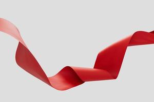 Swirling red fabric ribbon on white background 3d render. photo