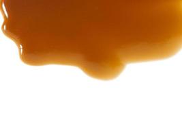 sauce caramel sweet isolated on white background photo