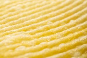 Potato chip texture background closeup photo