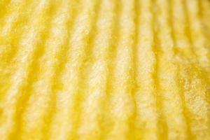 Potato chip texture background closeup photo