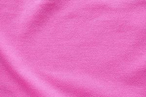 Pink cotton fabric texture closeup background photo