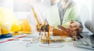 Scene of industrial engineers discussion, Construction architect with huge industry as a background, Concept of engineer project planning, professional teamwork. Selective focused. photo