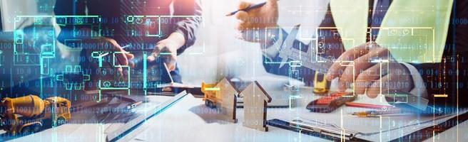 Scene of industrial engineers discussion, Construction architect with huge industry as a background, Concept of engineer project planning, professional teamwork. Selective focused. photo