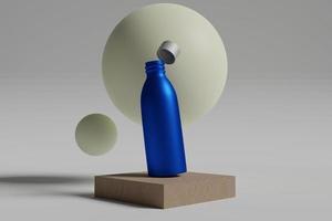 maqueta de una botella azul con fondo de objeto esférico foto