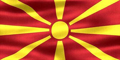 Ilustración 3d de una bandera de macedonia del norte - bandera de tela ondeante realista foto