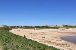 Sandy Beach and Tidal Marsh Along Cape Cod photo