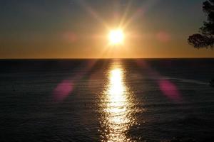 Catalan Costa Brava in the town of S'agaro, Mediterranean sea at dawn. photo