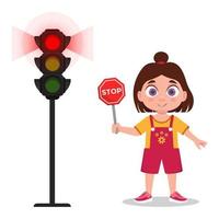 Child with stop sign. The traffic light shows a red signal