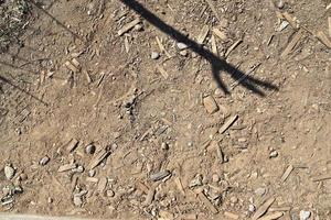vista de cerca detallada sobre una textura de suelo de arena marrón foto