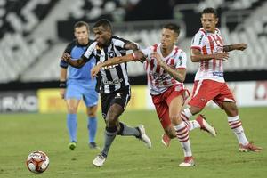 Rio, Brazil - march 06, 2018 -  Ezequiel and Marcos Junior players in match between Botafogo and Bangu by the Carioca Championship in Nilton Santos Stadium photo