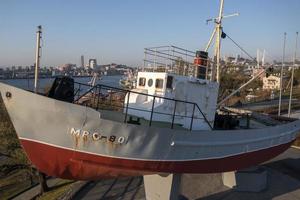 Vladivostok, Russia - October 24, 2021  The attraction of the city on the viewing platform. square of Fishing Glory photo