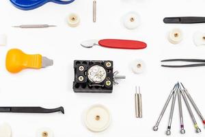 equipment for repairing watch on white photo