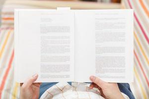 man read book with blurred text photo