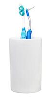 toothbrush and interdental brush in ceramic glass photo