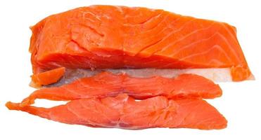 slices and piece of lighty smoked salmon red fish photo