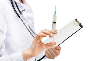 doctor holds syringe and clipboard isolated photo