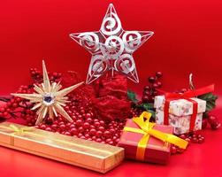 Christmas gift boxes isolated on red background. Christmas celebration concept. photo