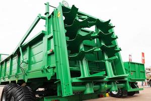 Minsk, Belarus, September 20, 2022- Tractor semi-trailer, trailer for applying mineral, nitrogen and chemical fertilizers to the soil. photo