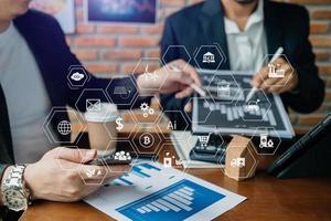 Business team working with reduce CO2 concept with icons, global warming such as reforest green factory recycle and zero carbon dioxide emission concept. with VR icon photo