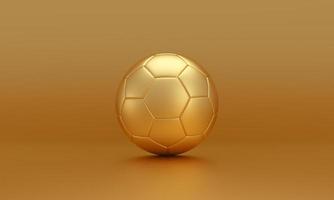 Golden soccer ball isolated on gold background. photo