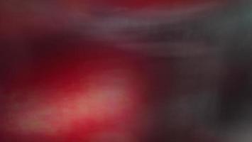 Abstract blur background with gray-brown, black, white, red and earth tones. photo