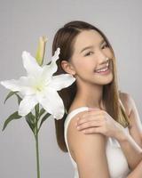 Portrait of beautiful asian woman over white background studio, skin care and beauty concept photo