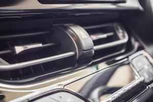Air conditioner in modern car close up photo