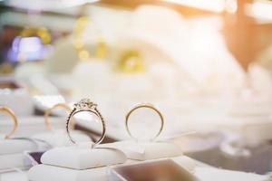 Jewelry diamond rings and necklaces show in luxury retail store window display photo