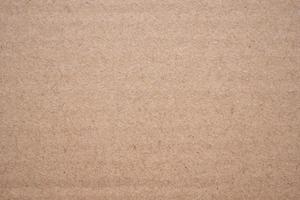 Abstract brown recycled cardboard paper texture background photo