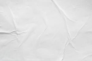 Blank white crumpled and creased paper poster texture background photo