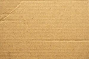 Abstract brown recycled cardboard paper texture background photo