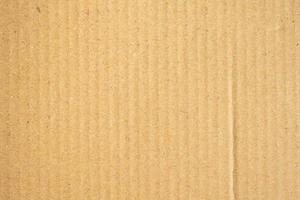 Abstract brown recycled cardboard paper texture background photo