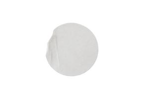 Blank white round paper sticker label isolated on white background with clipping path photo