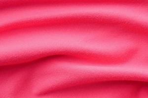 Abstract pink fabric cloth texture background photo