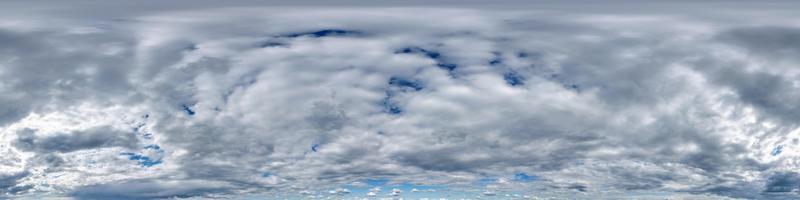 blue sky hdr 360 panorama with white beautiful clouds in seamless projection with zenith for use in 3d graphics or game development as sky dome or edit drone shot for sky replacement photo