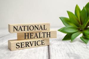 Text NHS National Health Service on a white background. photo