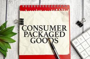 Text CPG - Consumer Packaged Goods text written on red notepad photo