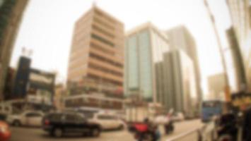 Blurred image background cityscape office building, Vintage style for your design photo