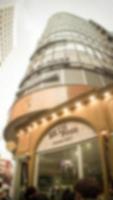 Blurred image background cityscape office building, Vintage style for your design photo