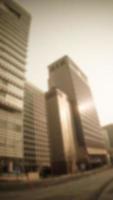 Blurred image background cityscape office building, Vintage style for your design photo