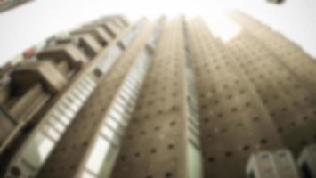 Blurred image background cityscape office building, Vintage style for your design photo