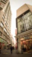 Blurred image background cityscape office building, Vintage style for your design photo