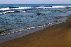 Sandy beach on the Mediterranean Sea in northern Israel. photo