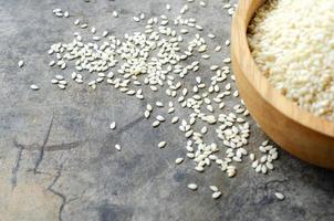 White sesame seeds on vintage wood backgrounds with macro close up photo
