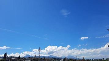 Blue sky with bright sunlight shining in the sky of Bandung photo