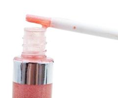 tip of brush with pink lip gloss photo