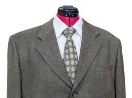 green tweed jacket with shirt and tie close up photo