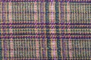 fondo de tejido de lana verde, marrón y violeta foto