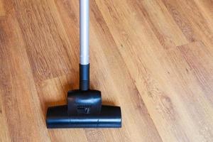 direct view vacuuming of floor by vacuum cleaner photo