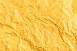 background from yellow crumpled paper photo